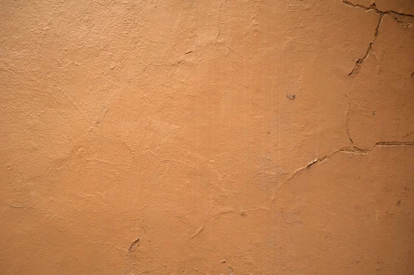 Textura de pared vieja cubierta con estuco marrón —  Fotos de Stock