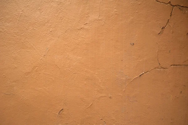 Textura de pared vieja cubierta con estuco marrón — Foto de Stock