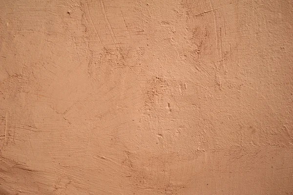 Textur der alten Mauer mit rosa Stuck verkleidet — Stockfoto