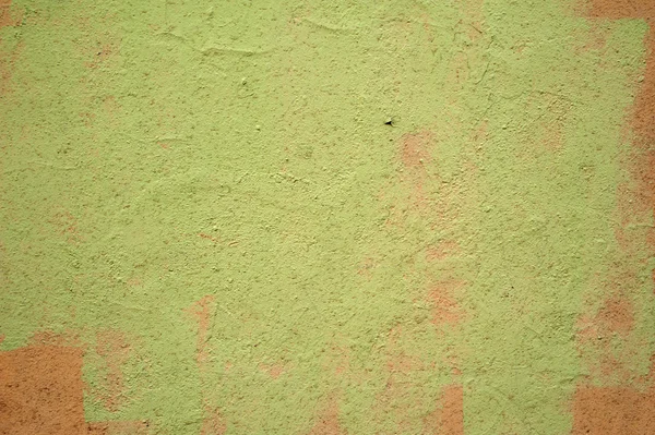 Textura de pared rústica vieja cubierta con estuco verde con marrón — Foto de Stock