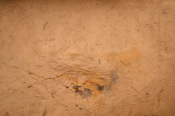 Texture de vieux mur recouvert de stuc brun — Photo