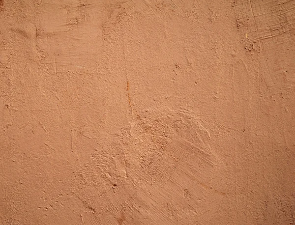 Textura de pared vieja cubierta con estuco rosa —  Fotos de Stock