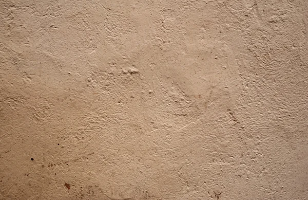 纹理的老墙上长满棕灰泥 — 图库照片