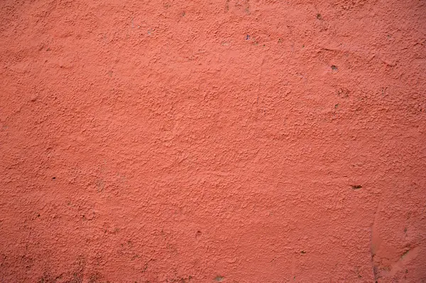 Textura de pared vieja cubierta con estuco rojo —  Fotos de Stock