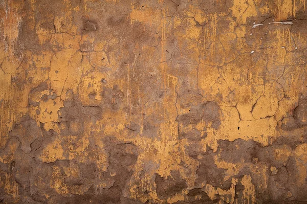 黄色の漆喰で覆われた古い壁のテクスチャ — ストック写真