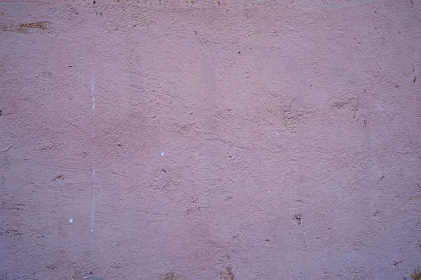 Textury staré zdi pokryté růžové štuky — Stock fotografie