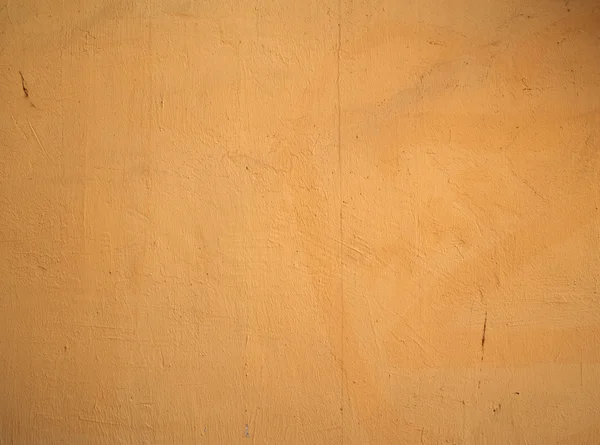 Textura de pared vieja cubierta con estuco amarillo — Foto de Stock