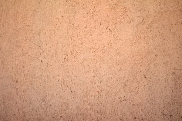 Textura de pared vieja cubierta con estuco rosa — Foto de Stock