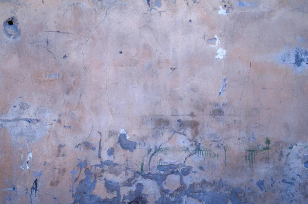 Tekstura stare ściany pokryte żółty sztukaterie — Zdjęcie stockowe