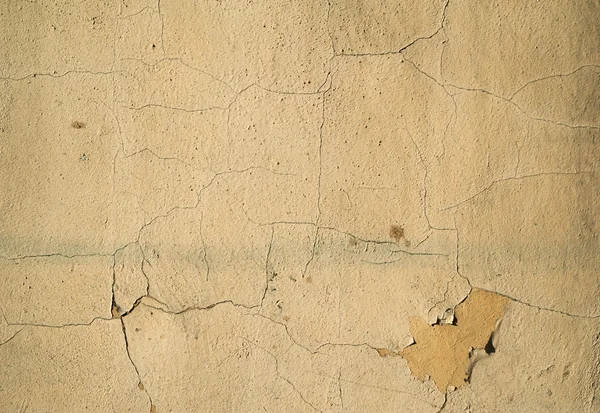 Texture of old wall covered with yellow stucco — Stock Photo, Image