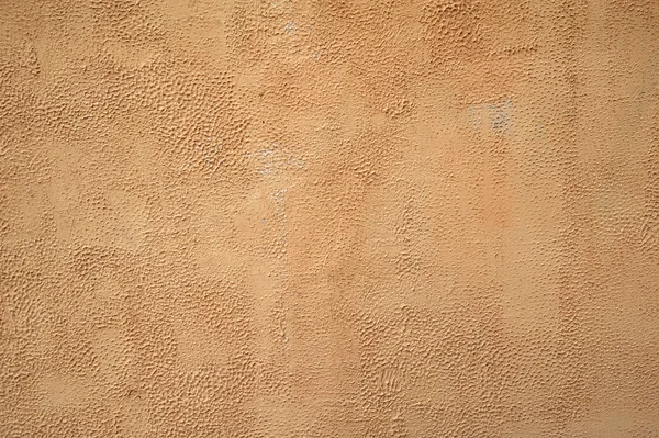 Textura de pared vieja cubierta con estuco marrón — Foto de Stock