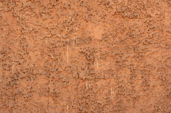 Textura da parede velha coberta com estuque marrom — Fotografia de Stock