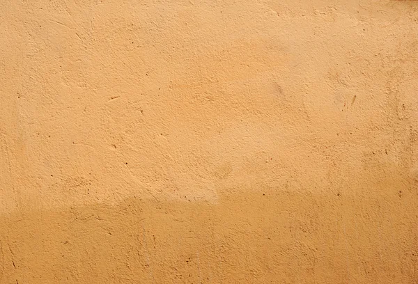 Textura de pared vieja cubierta con estuco marrón — Foto de Stock