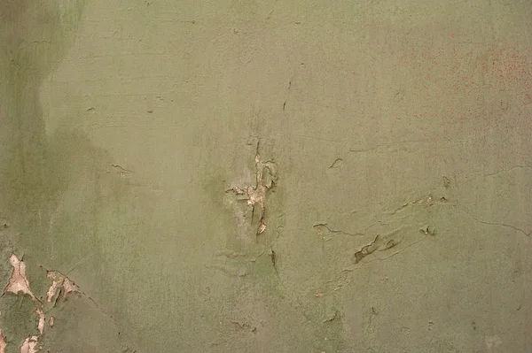 Текстура старой стены покрыта зеленой штукатуркой — стоковое фото