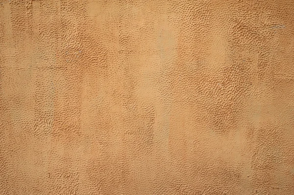 Textura de pared vieja cubierta con estuco marrón — Foto de Stock