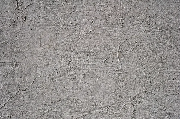 Texture de vieux mur recouvert de stuc gris — Photo