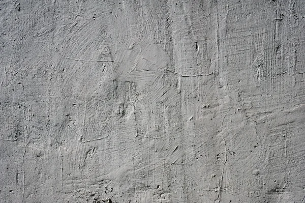 Текстура старой стены покрыта серой штукатуркой Стоковое Изображение