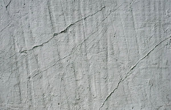 Textura de pared vieja cubierta con estuco gris — Foto de Stock