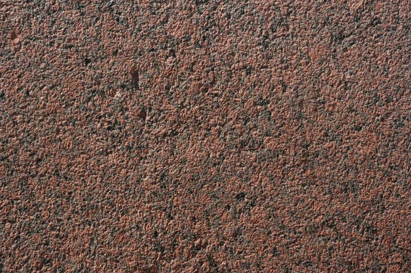 Текстура стены из полированного розового гранита — стоковое фото