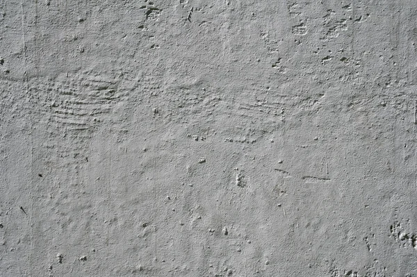 Textura de pared vieja cubierta con estuco gris — Foto de Stock