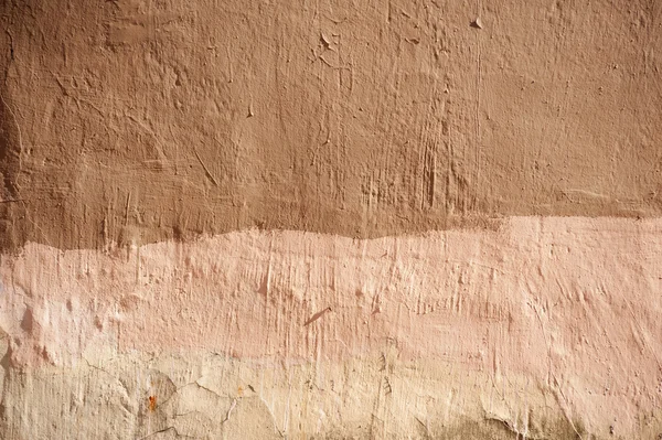 Textura de pared vieja cubierta con estuco marrón — Foto de Stock