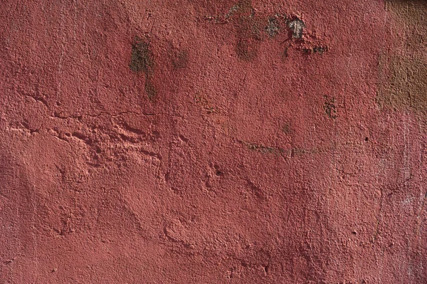 Textura de pared vieja cubierta con estuco rojo — Foto de Stock