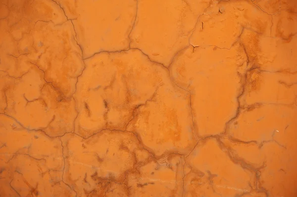 Textur der alten Mauer mit gelbem Stuck überzogen — Stockfoto