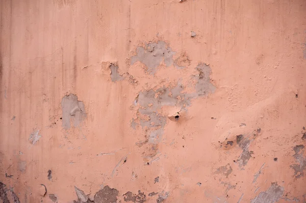 Textura de pared vieja cubierta con estuco rosa — Foto de Stock