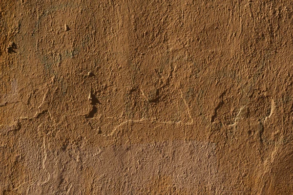 Textura de pared vieja cubierta con estuco amarillo — Foto de Stock