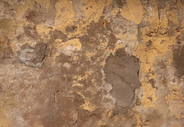 Textura de pared vieja cubierta con estuco amarillo — Foto de Stock