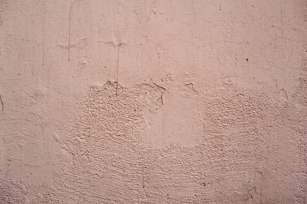 Textura de parede velha coberta com estuque rosa — Fotografia de Stock