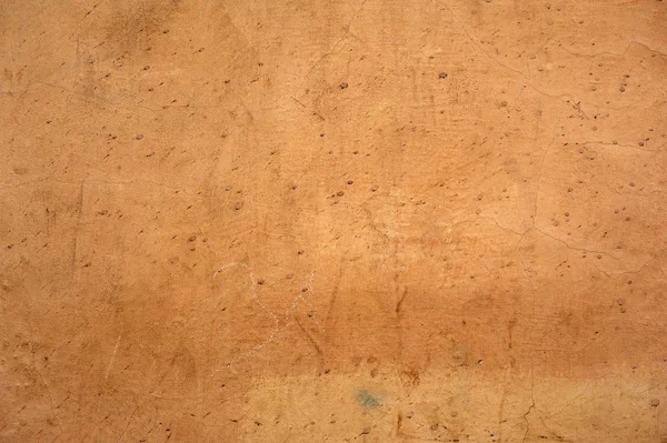 Текстура старої стіни покрита жовтим ліпниною — стокове фото