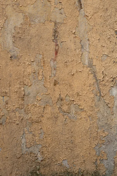 Textura de pared vieja cubierta con estuco amarillo — Foto de Stock