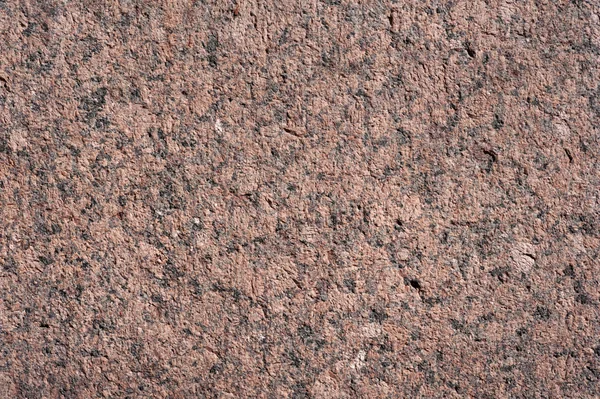 Textuur van muur van gepolijst roze graniet — Stockfoto