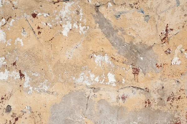 Textura de pared vieja cubierta con estuco amarillo — Foto de Stock