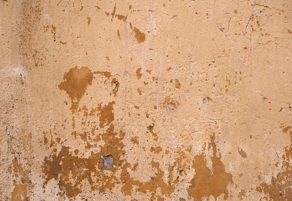 Textura de pared vieja cubierta con estuco amarillo — Foto de Stock