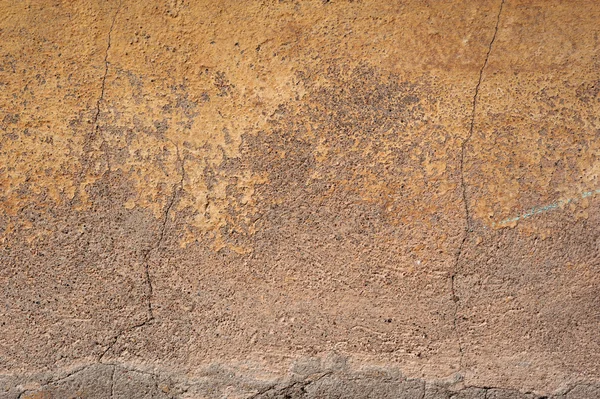 Textura da parede velha coberta com estuque marrom — Fotografia de Stock