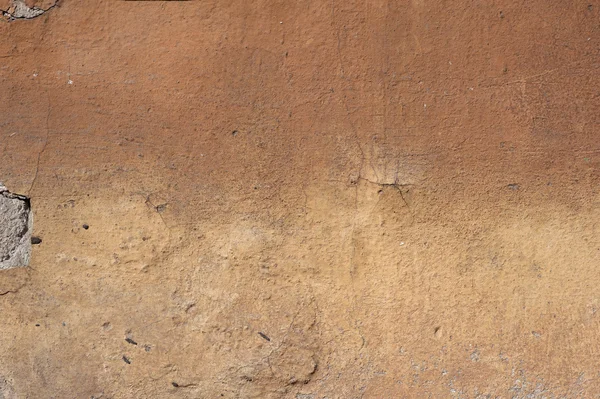 Textura de pared vieja cubierta con estuco marrón — Foto de Stock