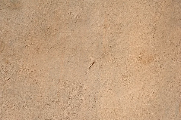 Texture of old wall covered with yellow stucco — Stock Photo, Image