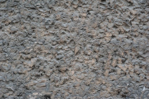 Textur der alten Mauer mit braunem Stuck überzogen — Stockfoto