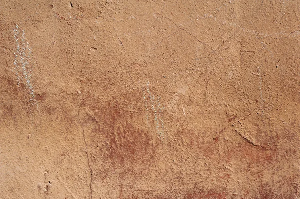 Textura de pared vieja cubierta con estuco marrón — Foto de Stock