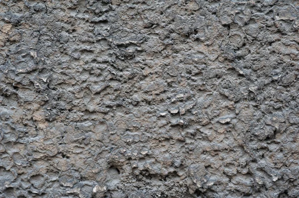 Texture di vecchia parete ricoperta di stucco marrone — Foto Stock