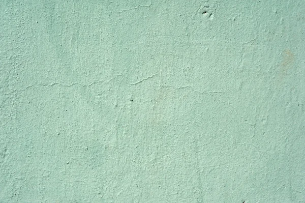 Textura de parede velha coberta com estuque verde — Fotografia de Stock