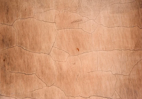 Texture di vecchia parete ricoperta di stucco marrone — Foto Stock