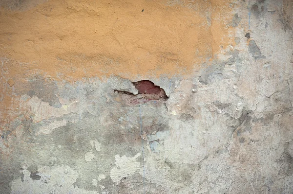 Texture of old wall covered with yellow stucco — Stock Photo, Image