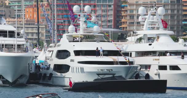 Monaco, Monte-Carlo, 28 September 2017: The largest exhibition of yachts and boats in Monaco, yacht brokers and richest clients on tenders and shuttle boats, traffic of boats — Stock Video