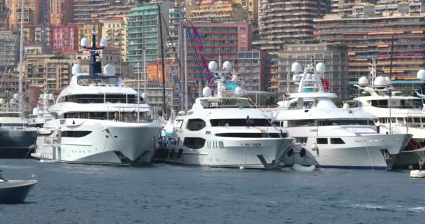 Monaco, Monte-Carlo, 28 September 2017: The largest exhibition of yachts and boats in Monaco, yacht brokers and richest clients on tenders and shuttle boats, traffic of boats — Stock Video