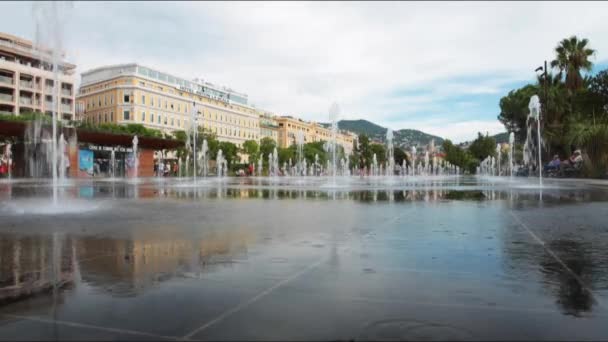 FRANCE, NICE, 15.09.2015: Mirror in water, place Massena, avenue Jean Medecin, Fontaine on Place Massena in Nice. The square is a modern part of the city and the contains several attractions, arts — Stock Video