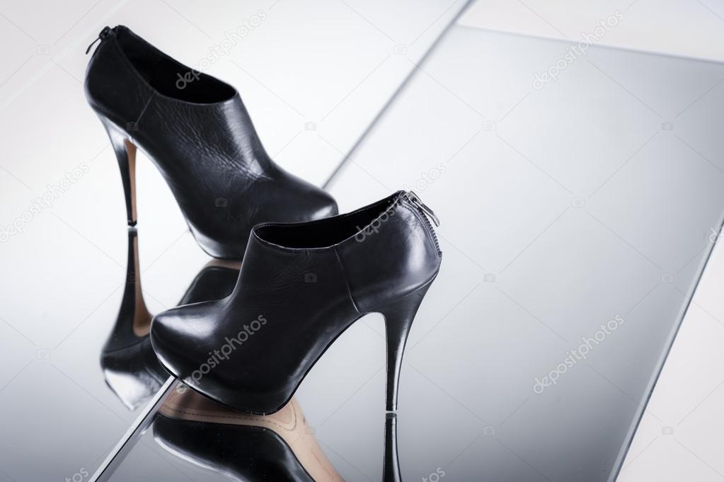 woman high heels black shoes