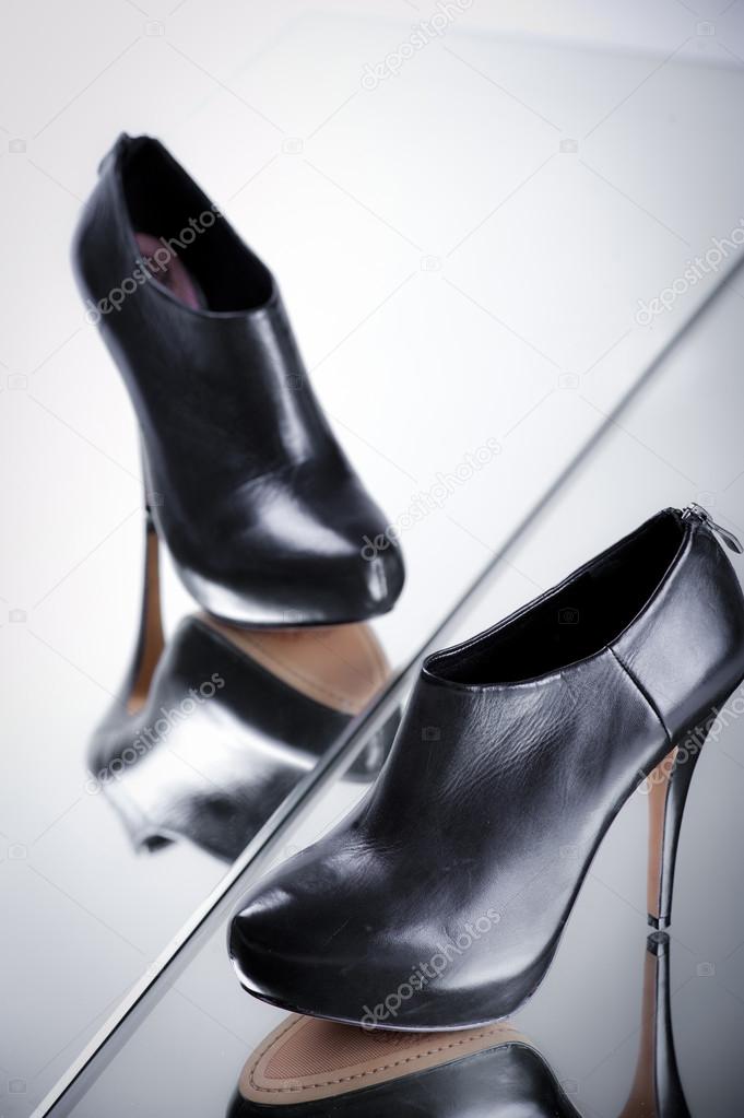 woman high heels black shoes